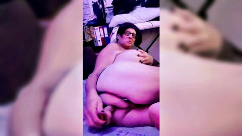 Chubby mature man lounging nude, exposing cock and ass