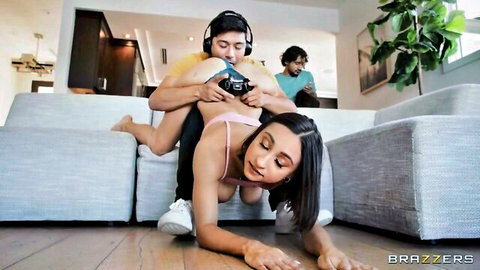 Tanned brunette in pink bra bent over doggy style on couch as guy grabs her bare ass ready to fuck her pussy