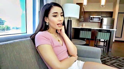 Aria Lee, cute Asian PAWG in pink top and white shorts, seductive pose