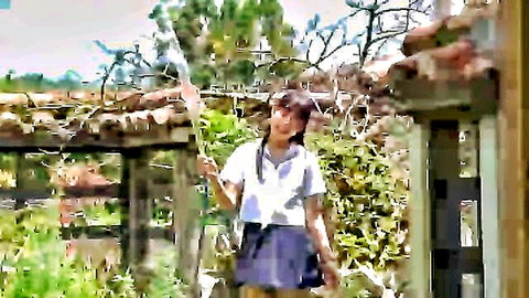Niihara Ayasato in school uniform outdoors, holding stick teasingly