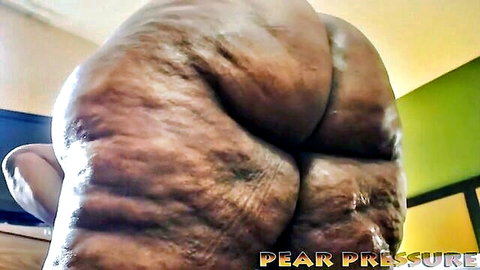 Close-up of massive ebony BBW ass cheeks, bare and explicit