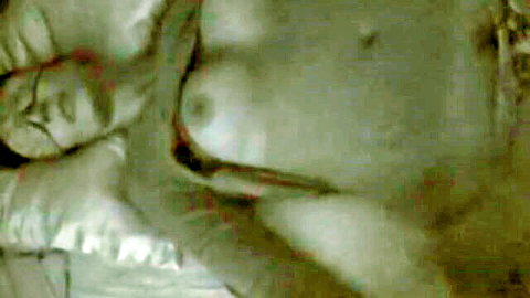 Blonde MILF with medium tits gives deep blowjob to big cock in car, mouth stuffed with dick.