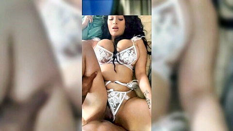 Curvy Latina with massive tits and big ass spreads legs in white lace lingerie exposing shaved pussy