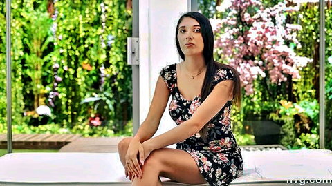 Exotic Italian-Brazilian beauty with long sexy legs in floral dress