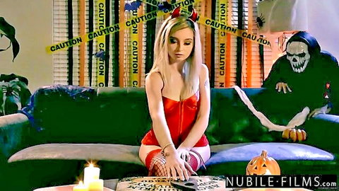 Lexi Lore as sexy little devil in red lingerie Halloween scene