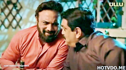 Two bearded South Asian men in intense close-up stare during Indian Ullu episode