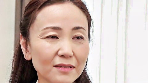 Mature Japanese wife in factory worker drama, close-up portrait