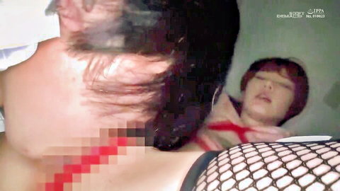 Cute Japanese teen bound in red ropes and fishnet, censored BDSM tease