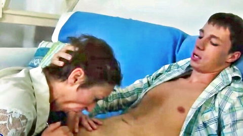 Amateur mommy giving blowjob to young toy boy on bed