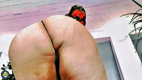 Mature BBW with big ass in black thong bending over