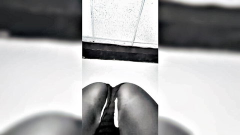 Thick ebony ass and thighs spread wide in tight black panties closeup