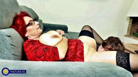 Mature redhead Gertruda enjoys cunnilingus from young Lenny Yankee