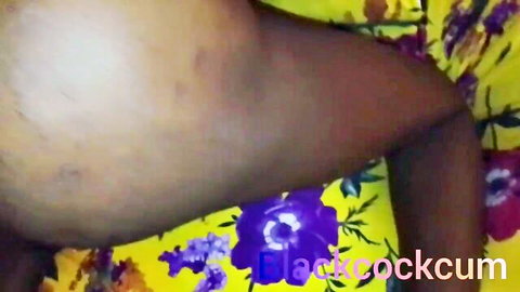 Ebony Calabar beauty in yellow floral dress, legs spread for BBC creampie sex