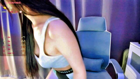 Hee_jin teasing in gray top, long hair, deep cleavage on Chaturbate