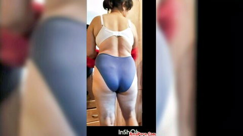 Amateur wife Vasyutka in white bra, blue swimsuit bottoms, red gloves, back view