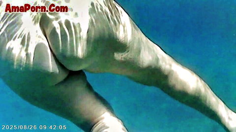Agata's nude underwater ass closeup from subaquatic camera view