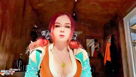 Sweetie Fox as Triss Merigold cosplay, redhead with pigtails in revealing outfit
