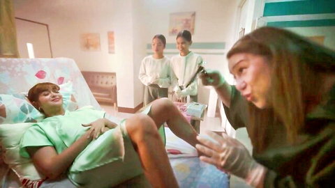 Sue Ramirez nude tits in sexy funny hospital exam scene Flower Girl 2025
