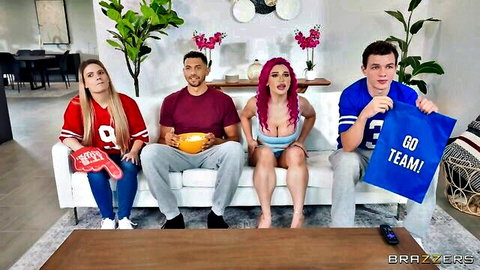 Lily Lou in red jersey cheers with busty pink-haired babe and guys - Brazzers sports scene