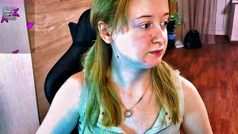 Sofiy Milashka cute skinny cam girl with green hair in tank top