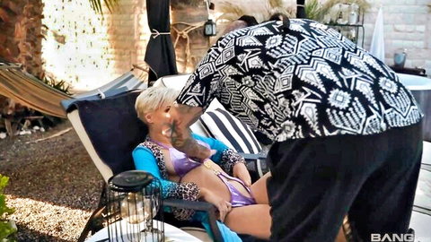 Afrodity Adami in steamy outdoor bikini kiss with tattooed lover