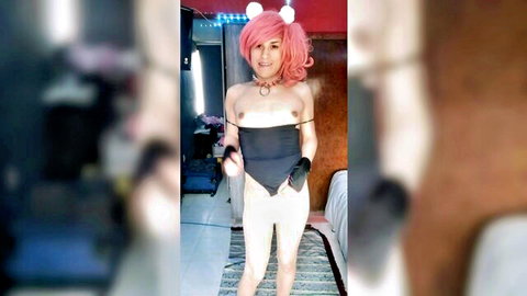 Pink-haired sissy trans posing in black harness exposing chest tight white pants cat ears collar