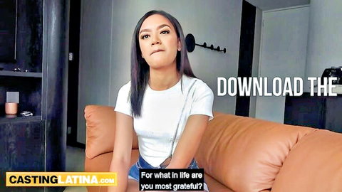 Hispanic ebony teen introduces herself in white crop top and jeans, thoughtful pose