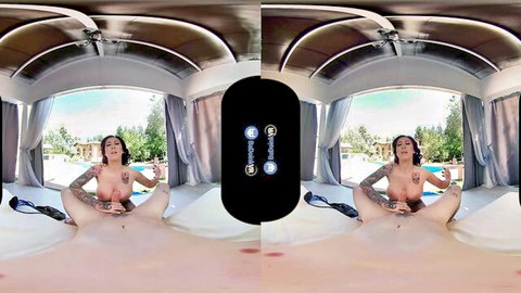 Tattooed brunette spreads legs wide exposing shaved pussy and tits in poolside cabana VR POV