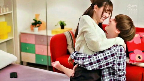 Akari Mitani lifted in smiling embrace by partner in hot Asian sex scene