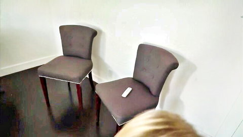 Blonde stepsister teases with remote in seductive setup