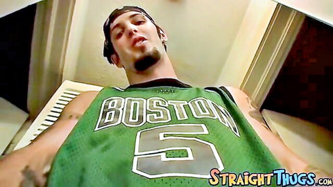 Young goateed stud in green Boston Celtics jersey lying back POV teasing