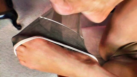 MILF pulls down sheer black pantyhose exposing wet shaved pussy closeup
