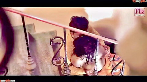 Indian MILF in saree passionately embraced by lover on stairs
