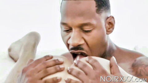 Black man with mustache tongue-fucks white woman's shaved pussy in closeup cunnilingus