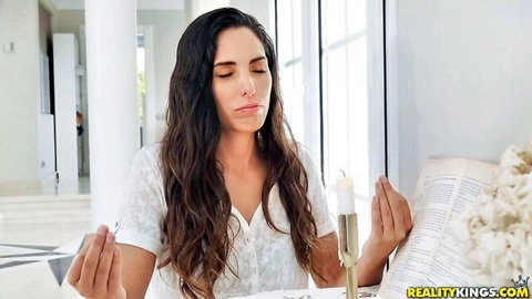 Lana Roy in sensual prayer pose with candle, teasing wild anal encounter