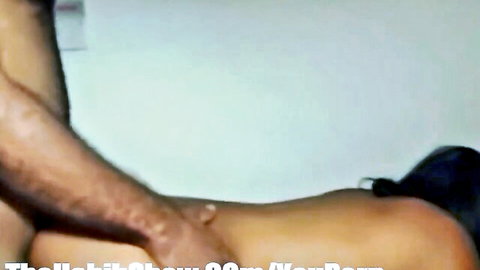Hairy armed man grabs and spreads nude brunette woman's bare ass cheeks from behind