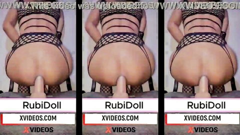 Big booty babe in fishnet lingerie bends over with huge pink dildo stuffed in her tight asshole