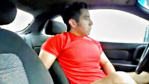 Hairy Latino stud relaxes in red shirt inside car, teasing stroke scene