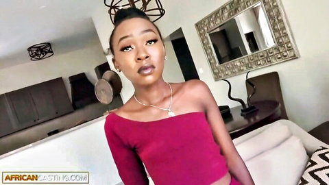 Tiny black afro beauty in sexy red off-shoulder top for casting try-out