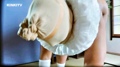 Blindfolded petgirl Beth in white frilly dress and stockings, bent over