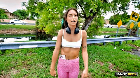 Jessie Belle in pink leopard leggings and crop top on BangBus outdoor walk
