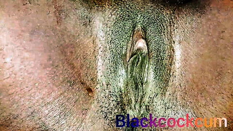Close-up of woman's wet pussy being fingered to climax in explicit porn