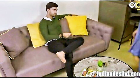 Indian man lounging on couch with woman in blue dress, Adla Badli web series scene
