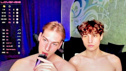 Two shirtless young European men close-up, one drinking from can
