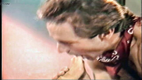 Bearded man with red bandana intensely licks woman's pussy in closeup oral sex action