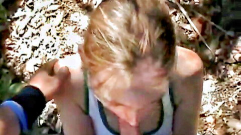 Blonde babe flashing perky tits outdoors as man's hand gropes her exposed breast in sunny woods