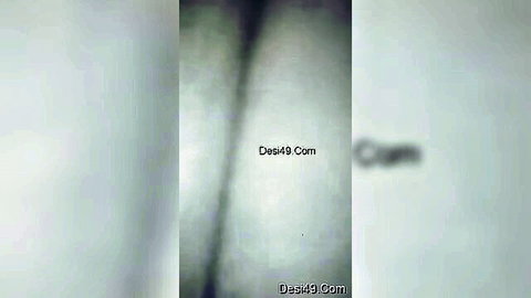 Young Desi girl pressing her natural tits in solo video
