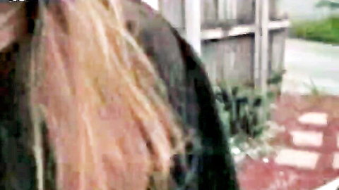 Clothed blonde babe giving outdoor blowjob to stranger in public