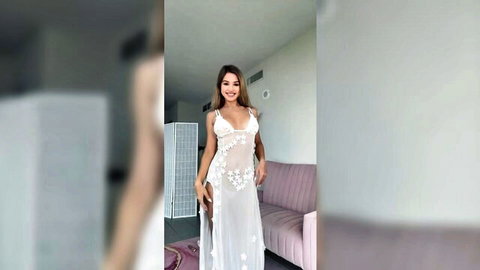 Asian beauty in sheer high-slit white lace dress pose