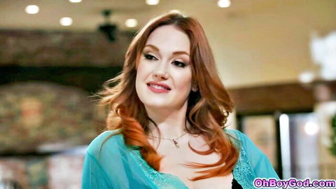 Siri Dahl redhead in sheer green top, seductive smile